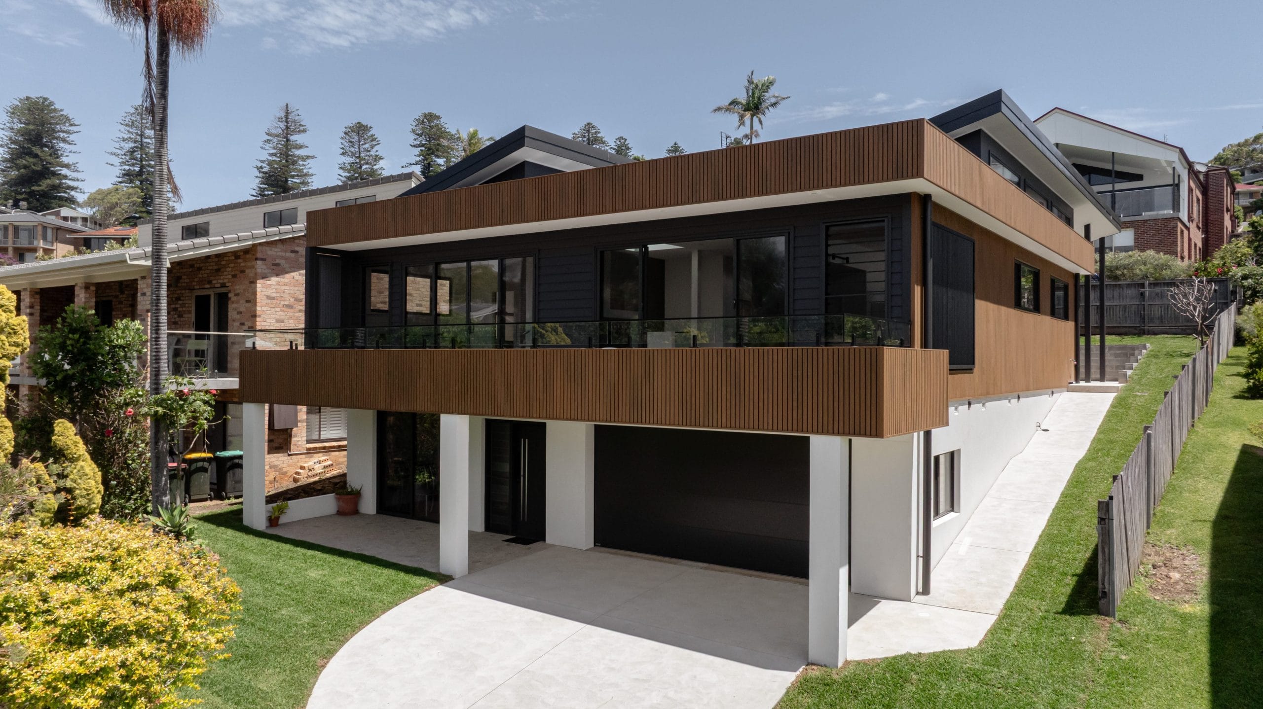 Renovated modern beach house by YourBuild Construct