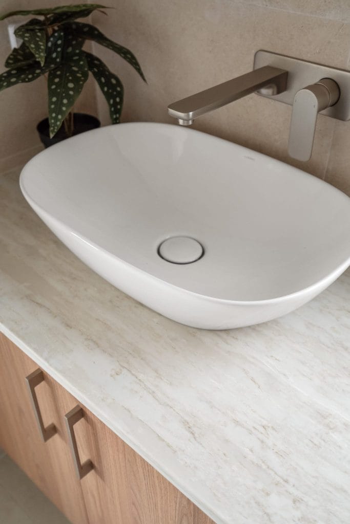 Detail of bathroom sink in a bathroom renovation project by YourBuild Construct
