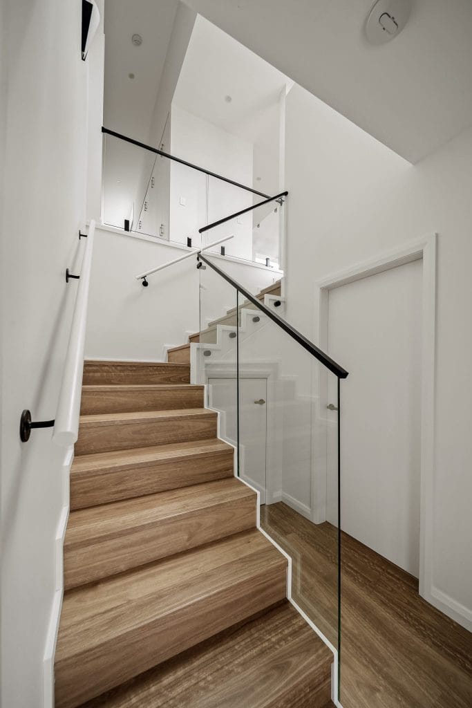 Timber staircase in a renovated home in Gerringong by YourBuild Construct