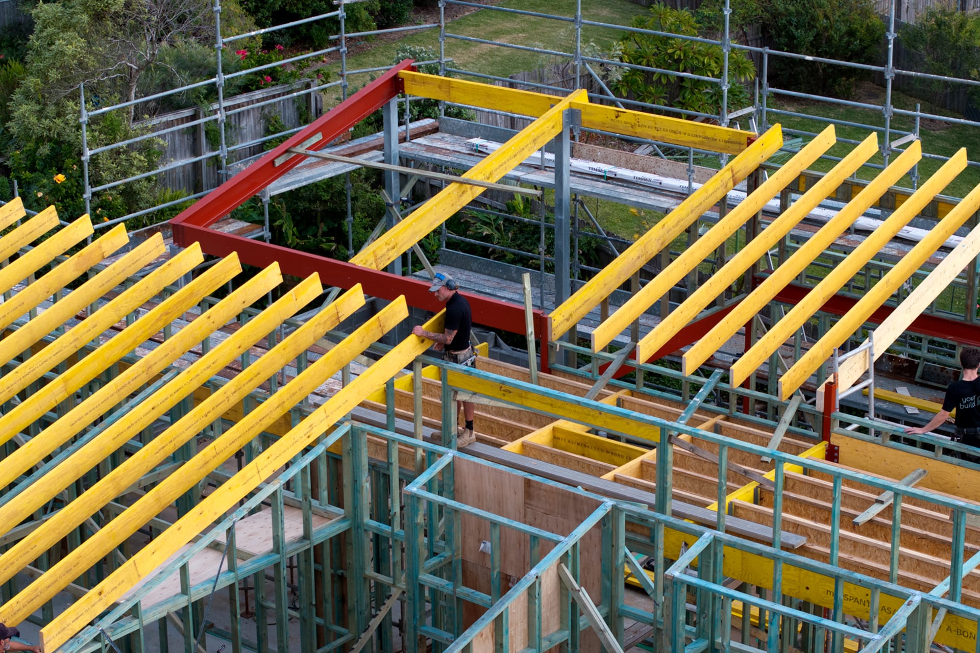 YourBuild Construct team member working on roof structure