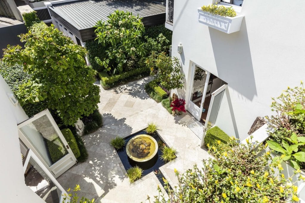 Birds eye view of a courtyard garden with water feature in Paddington NSW